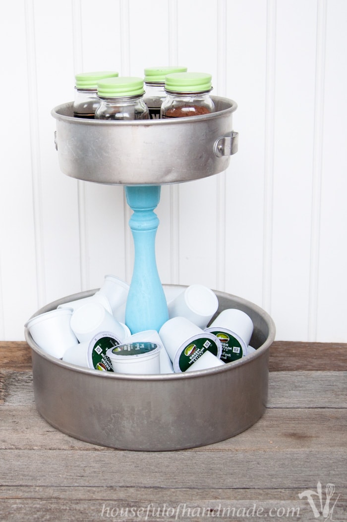 I love having a place to hold all the K-cups and fun spices for our coffee station. This DIY Rustic K-cup Holder with Spice Shakers is the perfect way to display them on a counter and it is super easy to make. | Housefulofhandmade.com