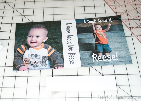 The printed cover of the kids book cut out next to a scrap piece of the label cut to size.
