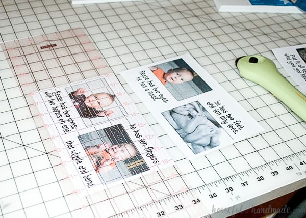 The printed labels for the inside of the custom book being cut in half.