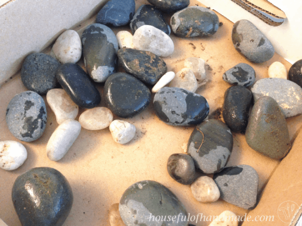 Create a beautiful indoor succulent rock garden for your table. Tutorial on Houseful of Handmade.