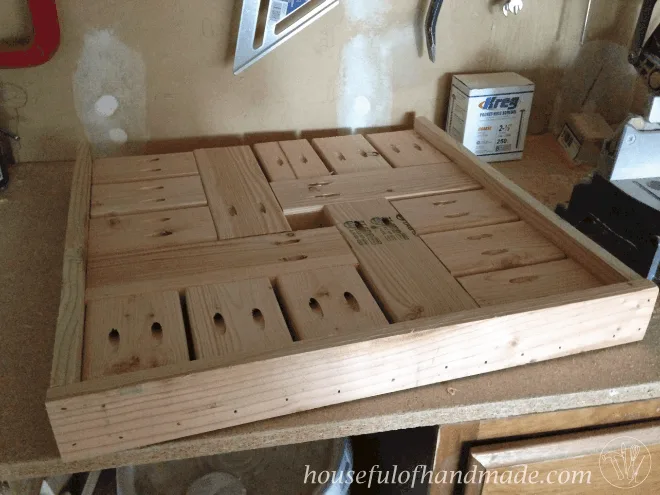 diy umbrella stand table top glued together and shown on work bench