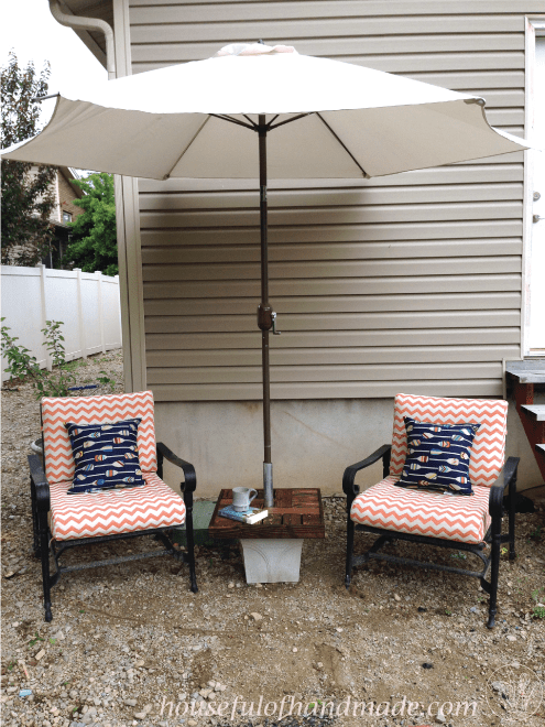 Make your own umbrella stand with a side table for cheap. Makes the perfect seating area to enjoy summer. Tutorial from Houseful of Handmade.