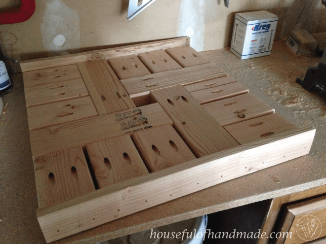 umbrella stand table top shown on work bench