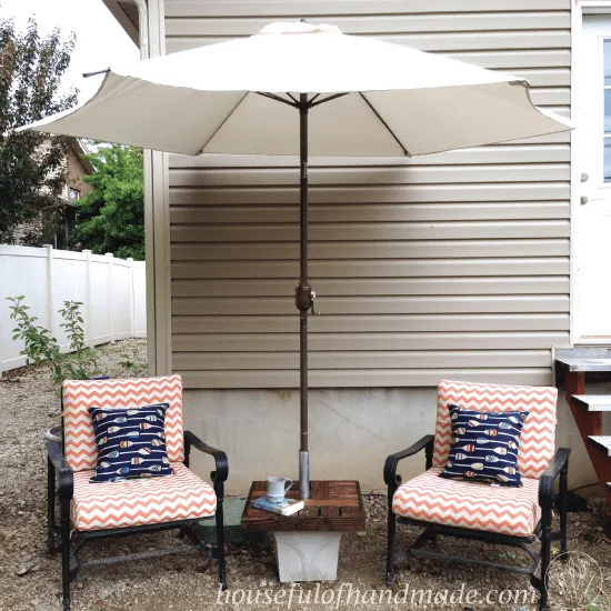 Make your own umbrella stand with a side table for cheap. Makes the perfect seating area to enjoy summer. Tutorial from Houseful of Handmade.