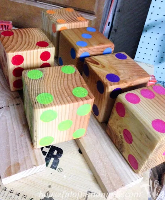 Make up a set of colorful yard dice to take to your next get together. Tutorial on Houseful of Handmade.