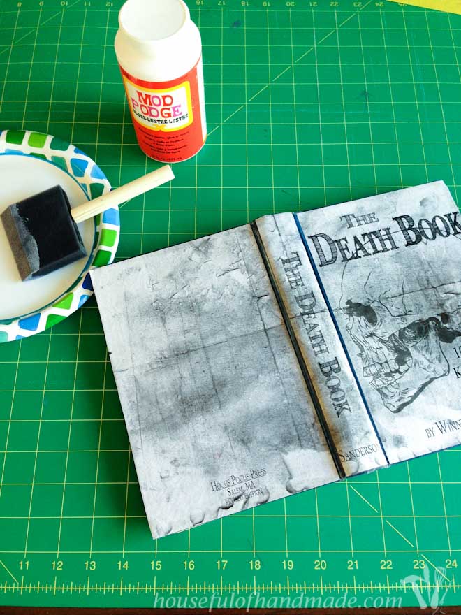 Use Mod Podge to transform a thrift store book into the perfect Halloween decorations. These free printable Halloween book covers are amazing! Housefulofhandmade.com