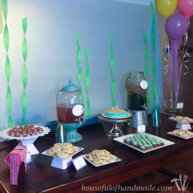 Lots of snacks on the table for this mermaid themed tea party.