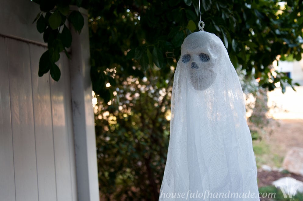 Make some super simpler, $3 skull ghosts to spooky up your house for Halloween. Tutorial on Houseful of Handmade.
