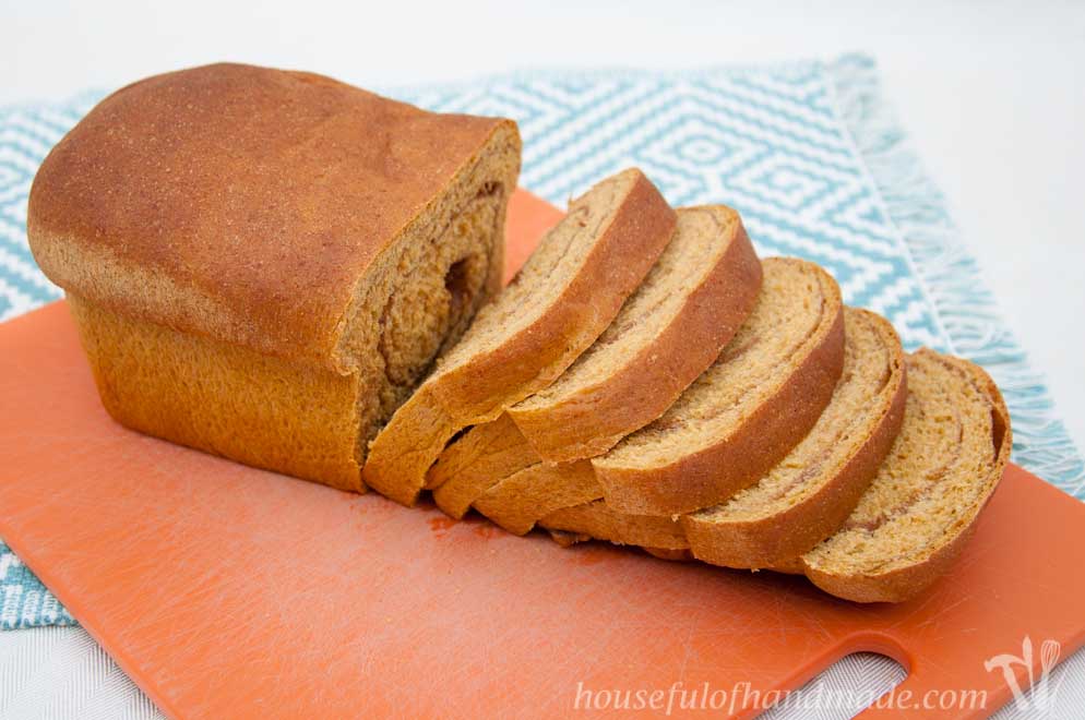 This is the most delicious bread. It is a soft & light whole wheat pumpkin bread with a pumpkin spice swirl inside. Recipe of Houseful of Handmade.