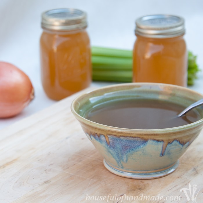 Learn how to make and preserve chicken stock for only pennies. Seriously, it takes just scraps to make a large pot of delicious stock for all your soup cravings this winter. | Housefulofhandmade.com
