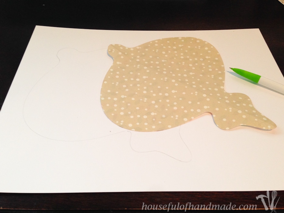 giant paper ornament template traced on white paper.