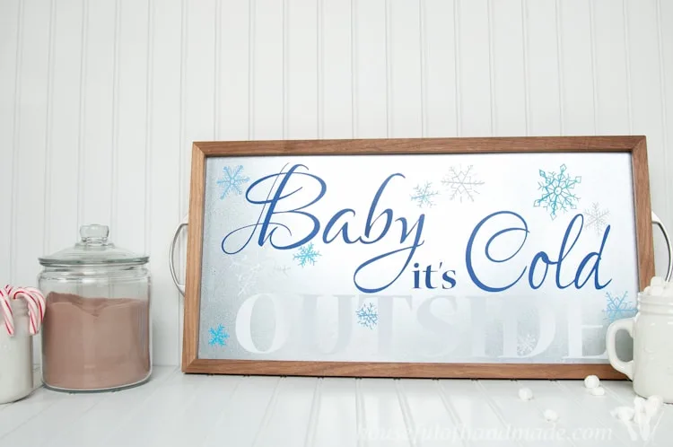 Time to warm up with this adorable decor for your hot cocoa or coffee station. Make a Baby It's Cold outside sign out of a DIY metal serving tray! | Housefulofhandmade.com | Housefulofhandmade.com