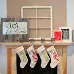 I love this sign! Make a beautiful reclaimed wood and steel Christmas sign that you can quickly change out your message for the next holiday! | Housefulofhandmade.com