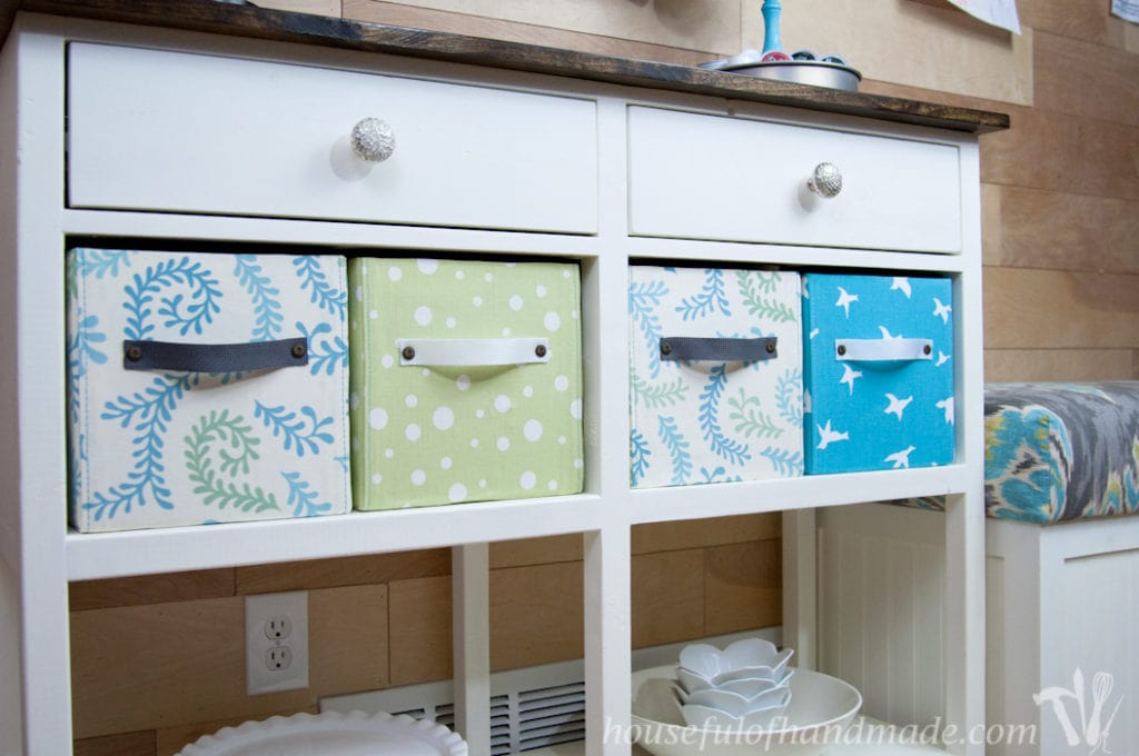 Coffee console table built with 2 drawers and fabric covers boxes. 