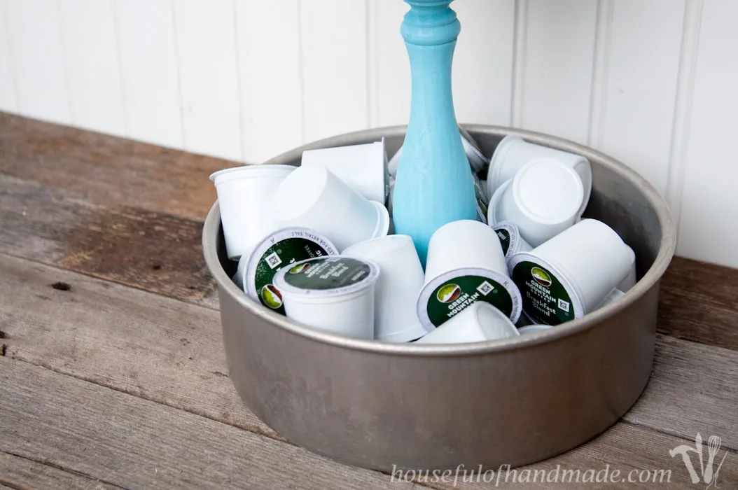 I love having a place to hold all the K-cups and fun spices for our coffee station. This DIY Rustic K-cup Holder with Spice Shakers is the perfect way to display them on a counter and it is super easy to make. | Housefulofhandmade.com