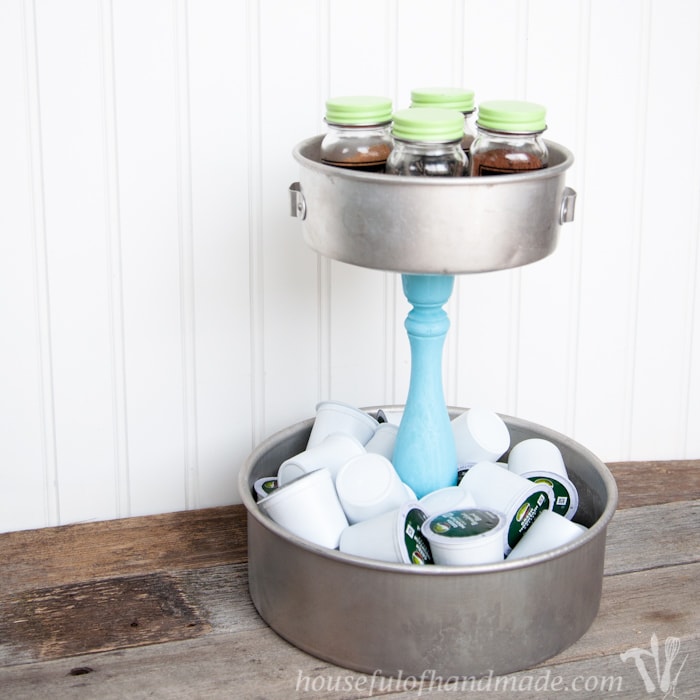 I love having a place to hold all the K-cups and fun spices for our coffee station. This DIY Rustic K-cup Holder with Spice Shakers is the perfect way to display them on a counter and it is super easy to make. | Housefulofhandmade.com