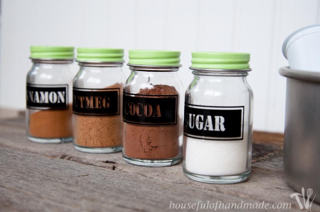 I love having a place to hold all the K-cups and fun spices for our coffee station. This DIY Rustic K-cup Holder with Spice Shakers is the perfect way to display them on a counter and it is super easy to make. | Housefulofhandmade.com
