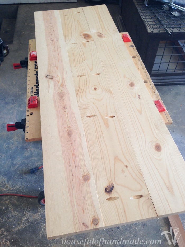 Attaching 3 long boards together to create the top for the coffee bar table. 