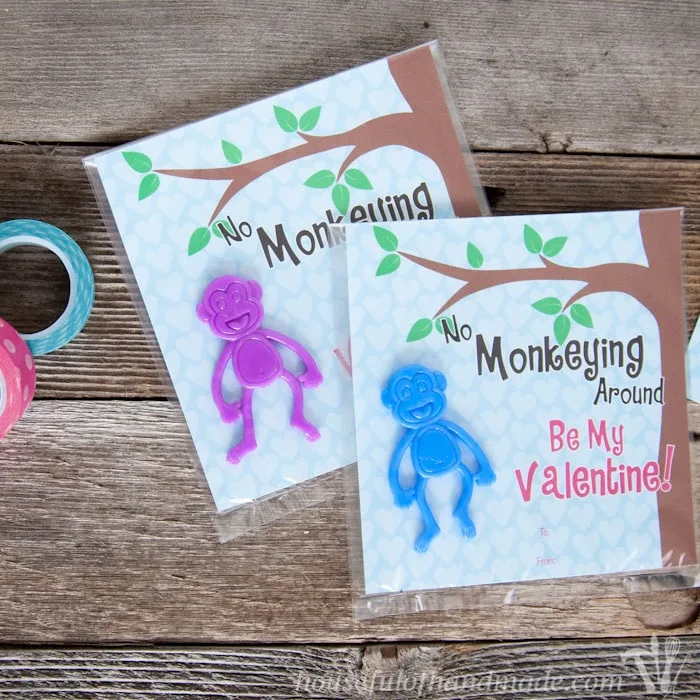 I love non-candy Valentines for the kids. These free printable monkey Valentines use stretch monkeys from the Dollar Spot. Super cute and easy! | Housefulofhandmade.com