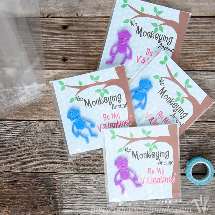 I love non-candy Valentines for the kids. These free printable monkey Valentines use stretchy monkeys from the Dollar Spot. Super cute and easy! | Housefulofhandmade.com