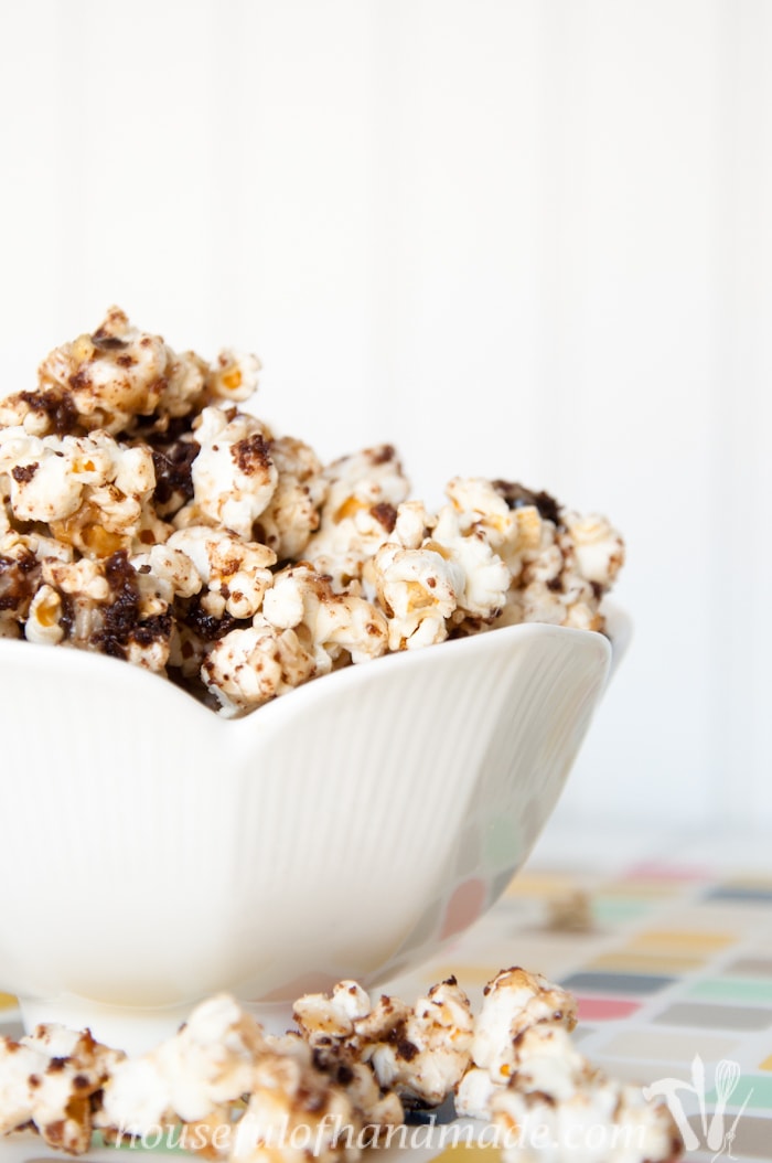 Caramel popcorn with coconut, pecans, and chocolate, what more could you want? This German Chocolate Cake Caramel Popcorn is the perfect fix for your sweet tooth. | HousefulOfHandmade.com