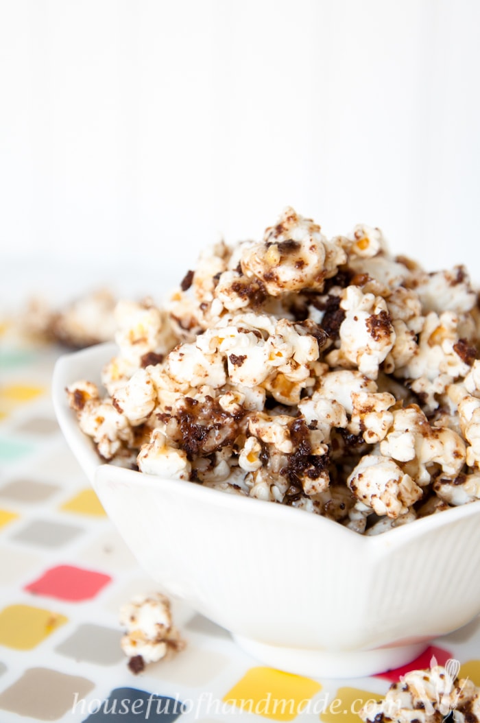 Caramel popcorn with coconut, pecans, and chocolate, what more could you want? This German Chocolate Cake Caramel Popcorn is the perfect fix for your sweet tooth. | HousefulOfHandmade.com