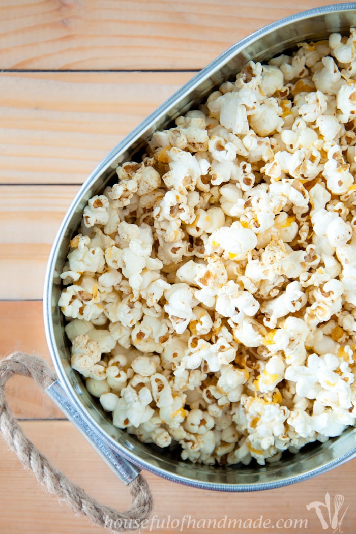 Make the most flavorful cheese popcorn without fake powdered cheese! This Sharp Cheddar Cheese Popcorn made from real cheese is easy and cheesy. | HousefulOfHandmade.com