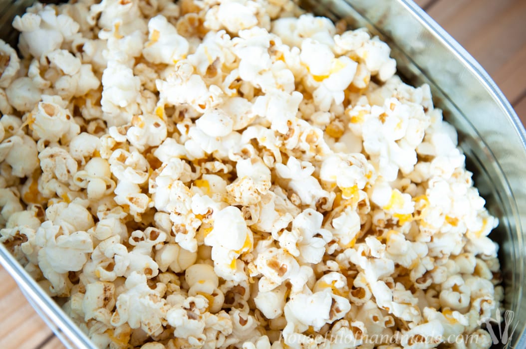 Make the most flavorful cheese popcorn without fake powdered cheese! This Sharp Cheddar Cheese Popcorn made from real cheese is easy and cheesy. | HousefulOfHandmade.com