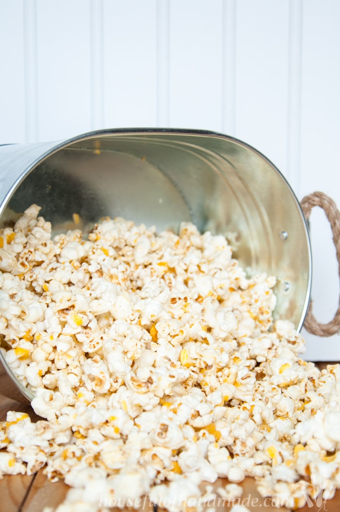 Make the most flavorful cheese popcorn without fake powdered cheese! This Sharp Cheddar Cheese Popcorn made from real cheese is easy and cheesy. | HousefulOfHandmade.com