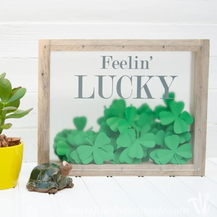 I love this fun St. Patrick's Day shadow box. The perfect way to bring a little green to your decor. | Housefulofhandmade.com