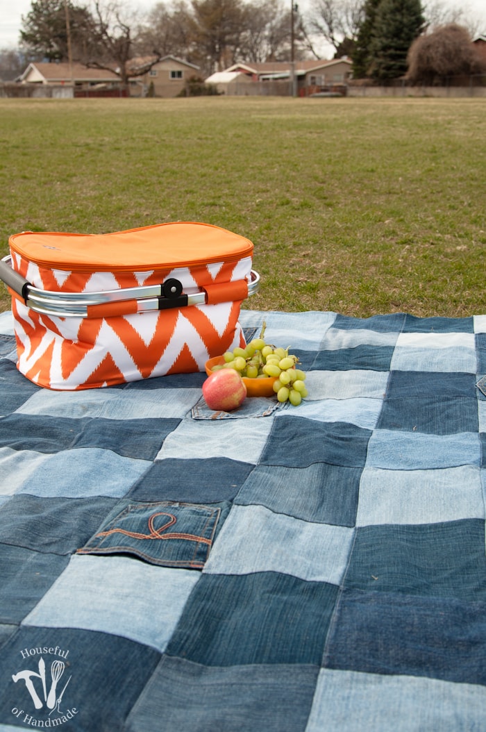This is the best picnic blanket ever! Make an Easy Water-Resistant Upcycled Jeans Picnic Blanket from your old jeans. It makes a super sturdy picnic blanket for the spring and summer. | Housefulofhandmade.com