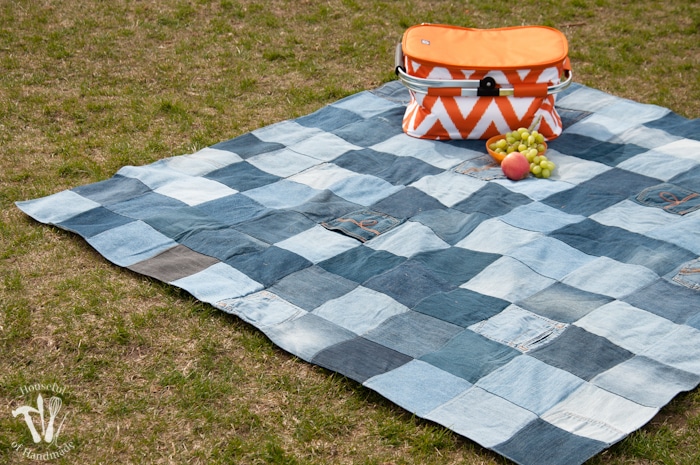 This is the best picnic blanket ever! Make an Easy Water-Resistant Upcycled Jeans Picnic Blanket from your old jeans. It makes a super sturdy picnic blanket for the spring and summer. | Housefulofhandmade.com