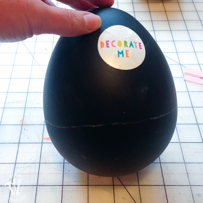 Turn boring decorative eggs into a jumbo chalkboard zipper Easter eggs to fill with clothes or toys. A simple and fun DIY for the perfect Easter basket! | Housefulofhandmade.com