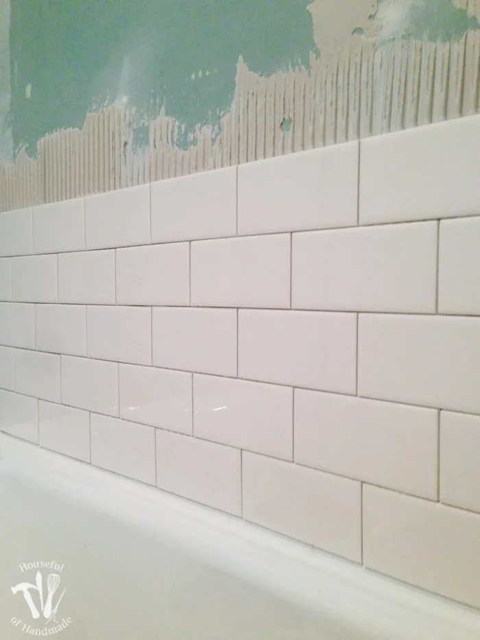 I've been working hard on the master bathroom remodel. This week I tackled tiling and learned a lot. Check out the update on the bathroom and see what I learned so you can avoid making the same mistakes. | Housefulofhandmade.com