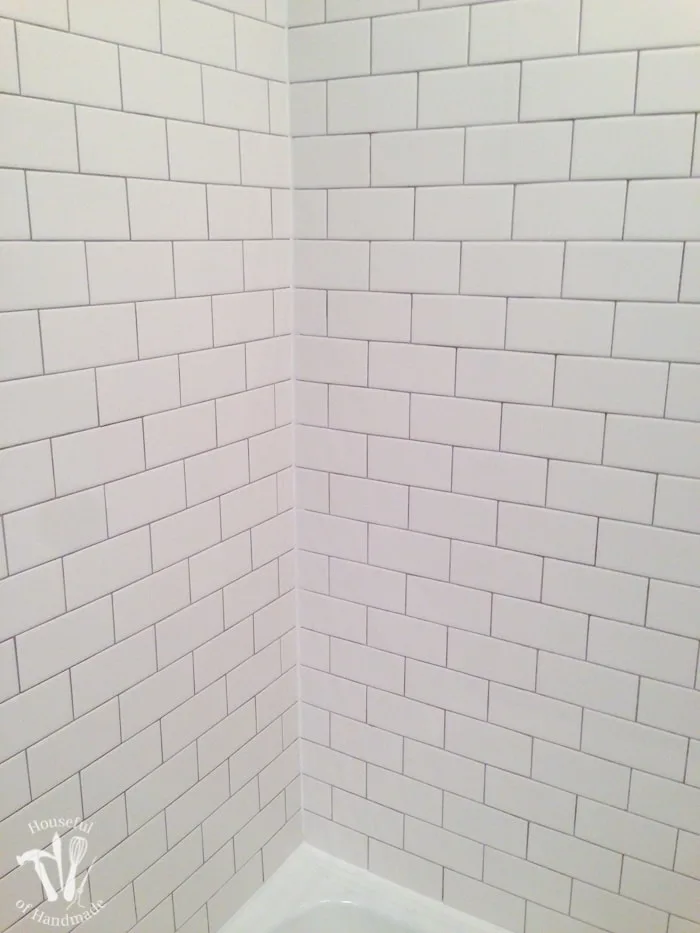 I've been working hard on the master bathroom remodel. This week I tackled tiling and learned a lot. Check out the update on the bathroom and see what I learned so you can avoid making the same mistakes. | Housefulofhandmade.com