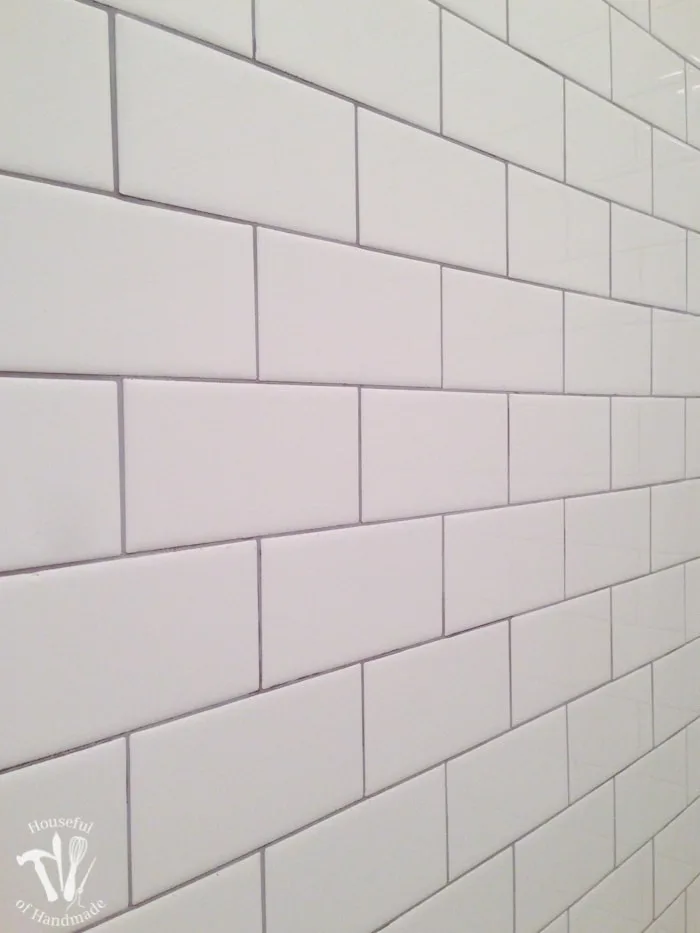 I've been working hard on the master bathroom remodel. This week I tackled tiling and learned a lot. Check out the update on the bathroom and see what I learned so you can avoid making the same mistakes. | Housefulofhandmade.com