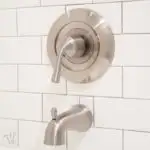 I thought installing new tub & shower fixtures would be easy, boy was I wrong! Before you start your own bathroom remodel you want to read what I learned about tub & shower trim and valves. | Housefulofhandmade.com