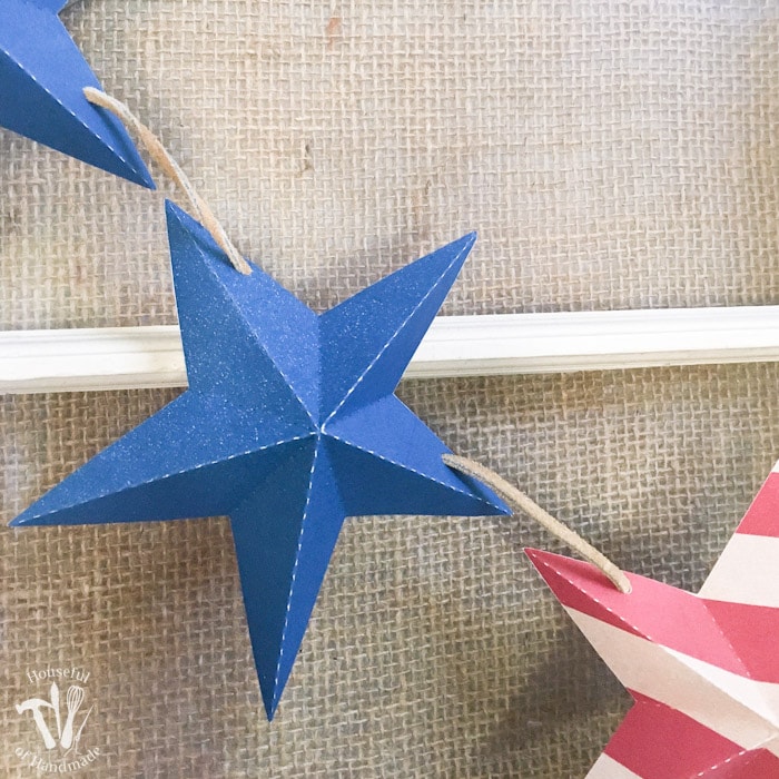 Decorate for a summer of barbecues and July 4th with this free printable stars and stripes patriotic banner. A quick 10 minute craft so you can get back to your summer. | Housefulofhandmade.com