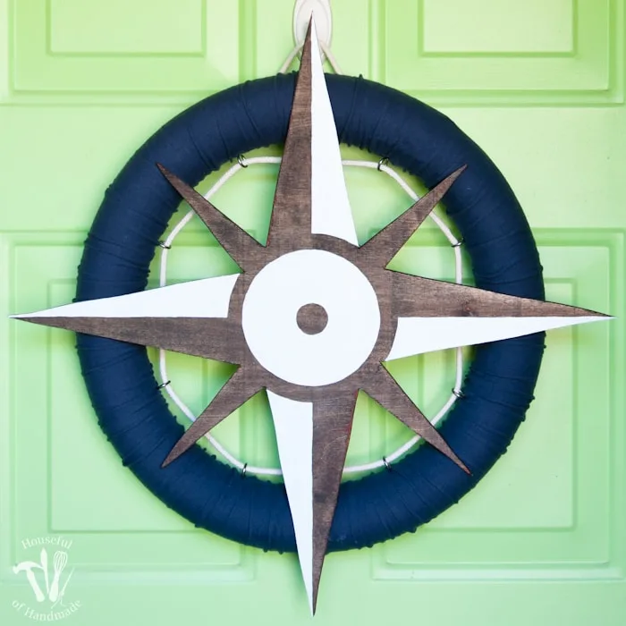 I love nautical decoration for summer! Make this fun nautical compass wreath to decorate your door with this year. | Housefulofhandmade.com