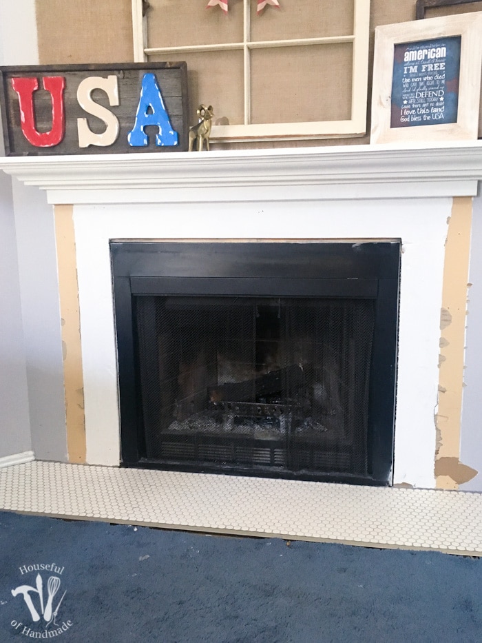 Redoing our fireplace to make a beautiful, vintage inspired, farmhouse fireplace. All the details on Housefulofhandmade.com