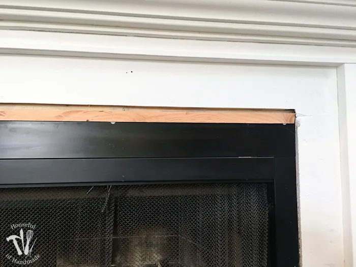 Remodeling our fireplace to make a beautiful, vintage inspired, farmhouse fireplace. All the details on Housefulofhandmade.com