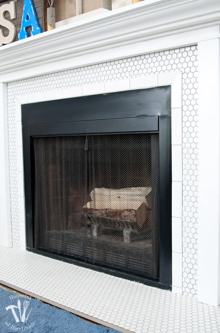 Remodeling our fireplace to make a beautiful, vintage inspired, farmhouse fireplace. All the details on Housefulofhandmade.com