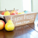 This is the most beautiful way to hold fruits and vegetables on the counter! This easy to make DIY farmhouse produce basket is a fun twist on a fruit crate. Perfect fall centerpiece to display all the produce from your garden. | Housefulofhandmade.com
