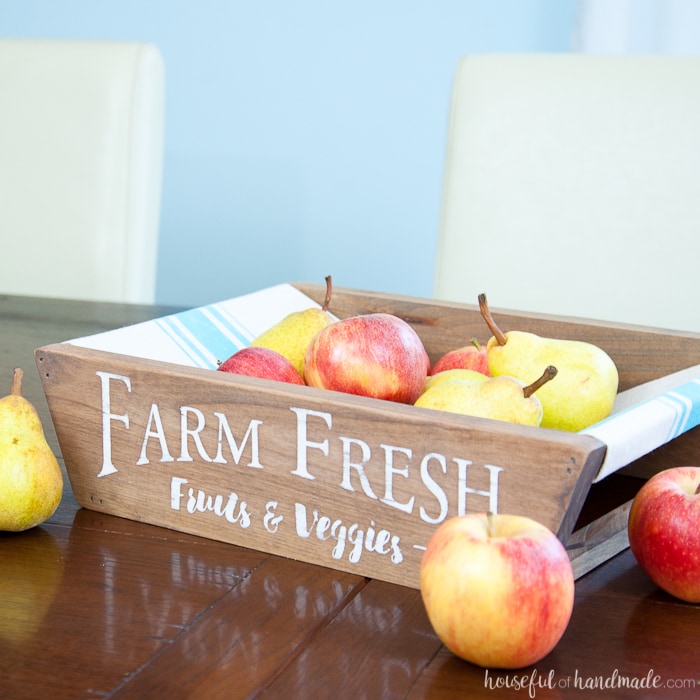This is the most beautiful way to hold fruits and vegetables on the counter! This easy to make DIY farmhouse produce basket is a fun twist on a fruit crate. Perfect fall centerpiece to display all the produce from your garden. | Housefulofhandmade.com
