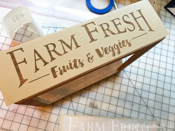 This is the most beautiful way to hold fruits and vegetables on the counter! This easy to make DIY farmhouse style produce basket is a fun twist on a fruit crate. Perfect fall centerpiece to display all the produce from your garden. | Housefulofhandmade.com