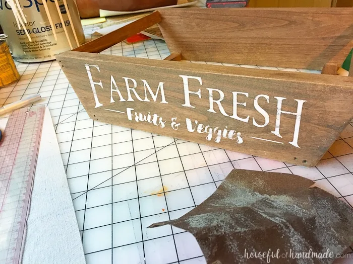 This is the most beautiful way to hold fruits and vegetables on the counter! This easy to make DIY farmhouse style produce basket is a fun twist on a fruit crate. Perfect fall centerpiece to display all the produce from your garden. | Housefulofhandmade.com