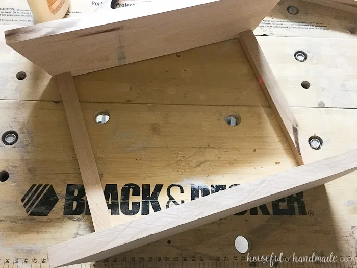 This is the most beautiful way to hold fruits and vegetables on the counter! This easy to make DIY farmhouse style produce basket is a fun twist on a fruit crate. Perfect fall centerpiece to display all the produce from your garden. | Housefulofhandmade.com