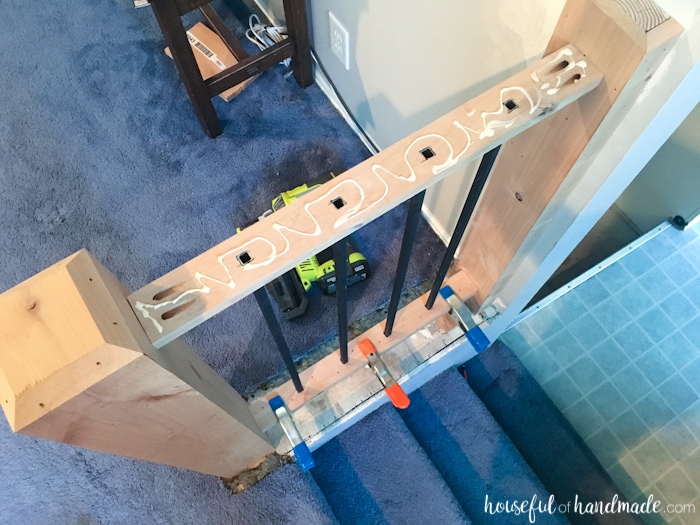 top view of wood railings with wood glue and clamps