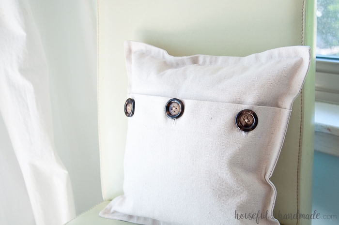 I love using drop cloth for farmhouse style pillows. This easy drop cloth pillow cover tutorial is the best way to add lots of throw pillows to your rustic decor. | Housefulofhandmade.com