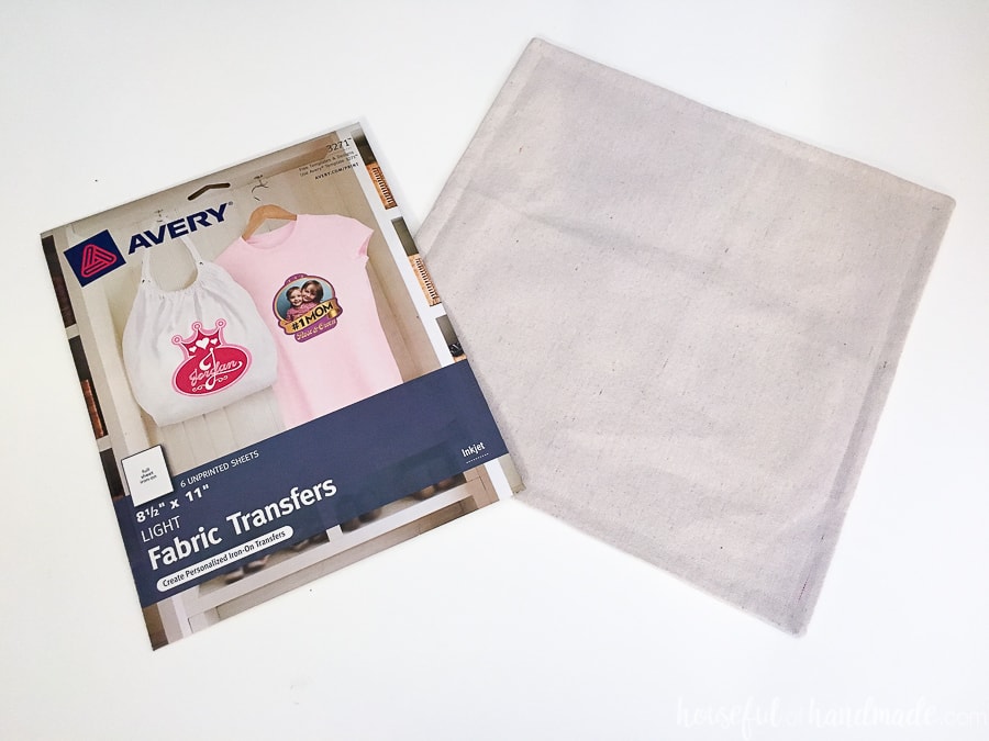 Drop cloth pillow form next to printable fabric transfers. 